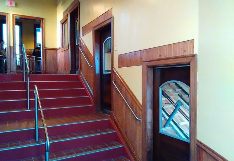 Photo of retrofitted sliding doors in a rail station