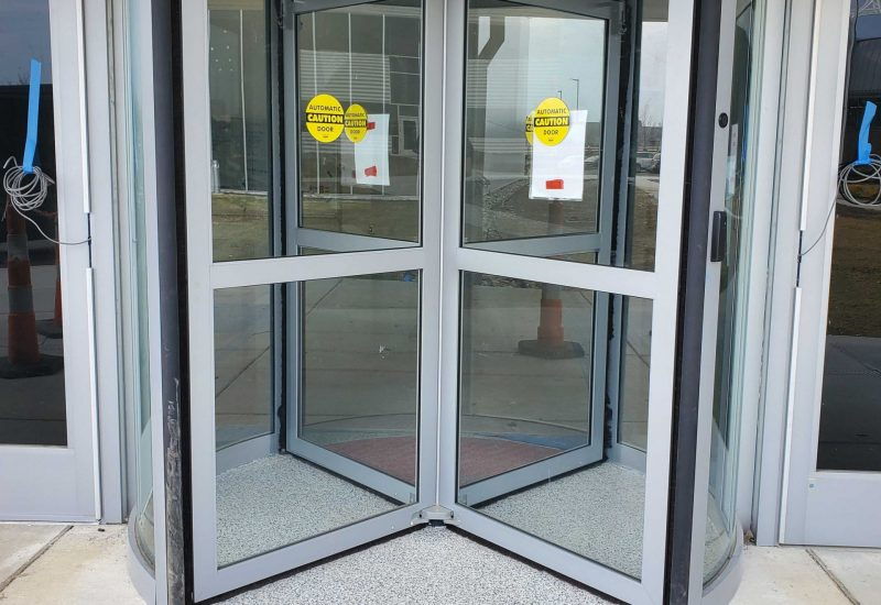 Close-up of an automatic revolving door installed in a pharmaceutical company