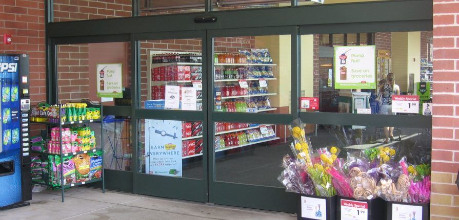 Sliding door obstructed by sales displays